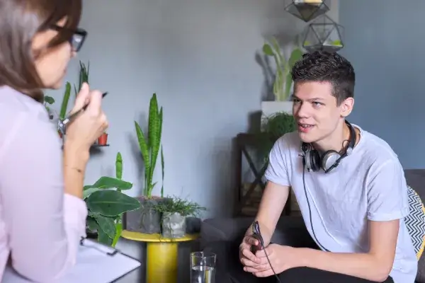 Boy playing happily in child therapy session